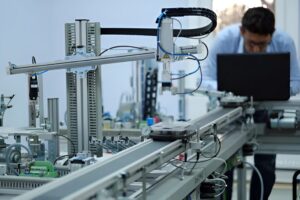 Students learning key topics like sensors, cloud computing, and IoT application development during The Core System’s IoT Summer Training program.